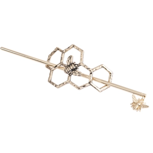 Detail view of retro gold honeycomb hair pin featuring intricate bees and hive patterns