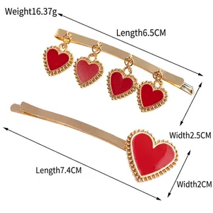 Vintage gold hair clips set with red heart oil drip charms and detailed size measurements