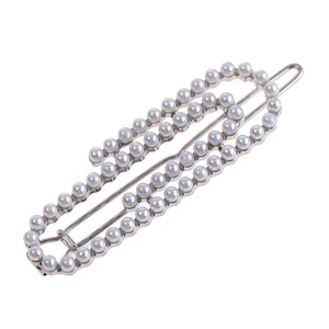 Barrette à cheveux ondulée en métal argenté avec deux rangées de perles blanches