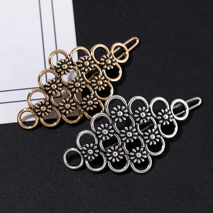 Vintage hollow metal flower hair clips in gold and silver finish for women fashion