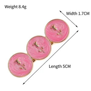 French vintage pink enamel rose hair clip with round gold frames and floral design