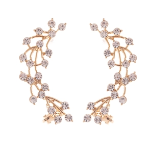 Close-up of gold-plated grape vine ear climbers with sparkling clear crystal rhinestones