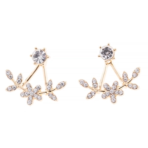 Close-up of golden floral stud earrings featuring micro-pave white rhinestones and crystals