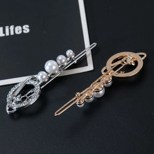 Elegant gold and silver planet hair clips with sparkling rhinestones and white pearls