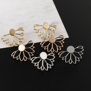 Three pairs of lotus flower stud earrings in gold silver and rose gold hollow design