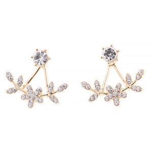 Gold flower and leaf stud earrings with pavé crystal accents on white background