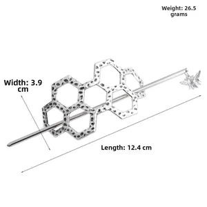 Detail view of retro honeycomb hair pin with dimensions showing 12.4cm length