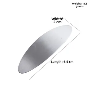 Detail view of oval brushed metal hair clip showing 6.5cm length and 11.5g weight