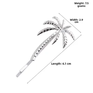 Detailed view of silver palm tree alloy hair clip with dimensions 6.1cm by 2.9cm