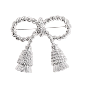 Elegant silver bow brooch with twisted rope design and delicate metal tassels