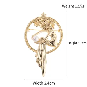 Vintage gold lady profile brooch with pearl accent in a circular frame design