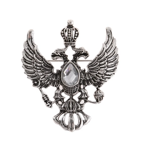 Spilla vintage aquila bicipite con corona e cristallo in finitura argento antico