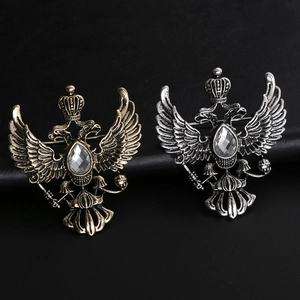 Spille vintage con aquila a due teste in bronzo e argento con dettagli in cristallo
