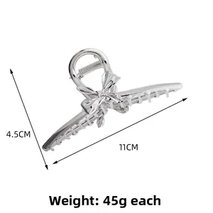 Dimensions détaillées de la pince à cheveux papillon en métal argenté avec 11 cm de long et 4,5 cm
