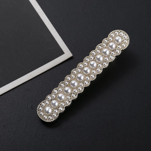 Elegant rectangle pearl hair clip with three rows of white pearls and wavy beaded edges
