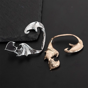 Gothic dragon wing ear cuff earrings in silver and bronze finish with heart detail