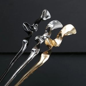 Macro view of Chinese geometric wavy metal hairpins in gold, silver, and black finishes