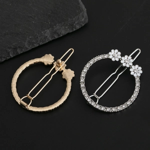 Barrettes rondes élégantes avec strass et fleurs en émail en finitions or et argent