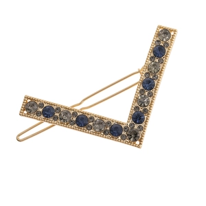 Vintage gold V-shaped hair clip with mixed blue and grey rhinestones on a metal base
