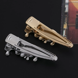 Barrette à cheveux irrégulière en métal fluide avec finition dorée et argentée