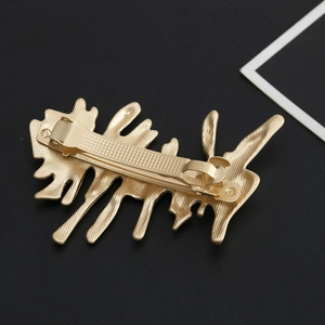 Irregular gold alloy branch hair clip with matte finish and spring mechanism