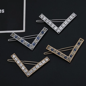V-shaped rhinestone hair clips set with gold and silver metal bases and mixed color crystals