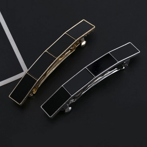 Elegant geometric black acrylic hair clips with gold and silver metal frames for women