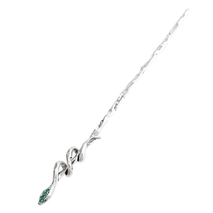 Vintage silver snake hair pin with green gemstones in a minimalist gothic serpent style