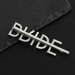 Sparkling silver rhinestone letter BRIDE hair pin for weddings on natural rock