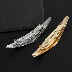 Modern brushed metal geometric ponytail hair clips in gold and silver finishes