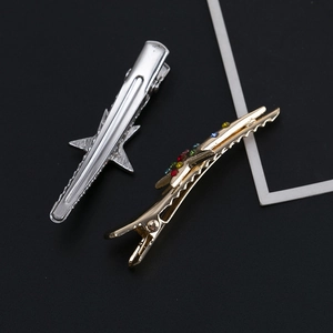 Minimalist metal star hair clips in gold and silver with colorful crystal rhinestones