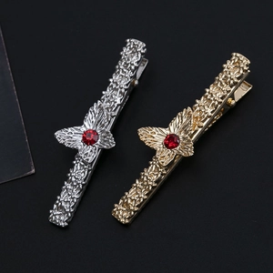 Vintage gold and silver butterfly hair clips with red ruby gemstone and floral patterns