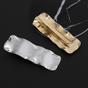 Irregular wavy metal duckbill hair clips in gold and silver finish for women