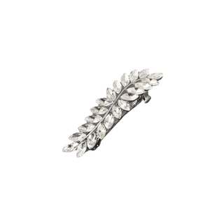Detailed view of silver leaf hair clip with marquise-cut crystal embellishments