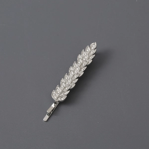 Silver leaf-shaped hair clip with sparkling rhinestones in a minimalist wheat ear design