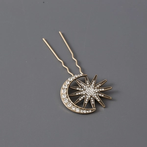 Eleganter goldener Haarschmuck mit funkelndem Mond- und Stern-Design und Strasssteinen