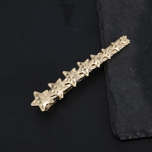 Barrette à cheveux dorée en alliage avec étoiles texturées, pince à cheveux minimaliste