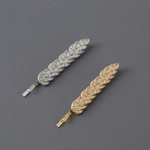 Sparkling leaf hair clip set with rhinestones in gold and silver finish for women