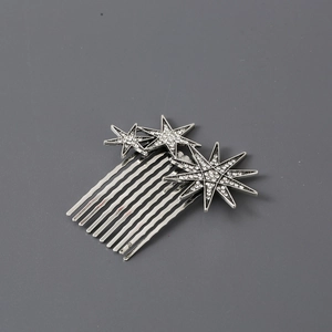 Sparkling silver star hair comb with rhinestones for bridal or party hairstyle