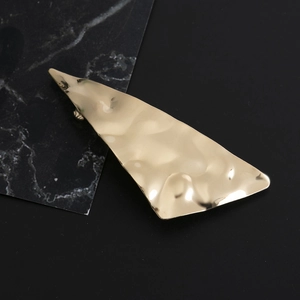Polished gold irregular triangle hair clip with hammered metal texture for women