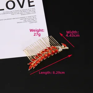 Detail of red rhinestone leaf hair comb with dimensions 8.29cm length and 27g weight