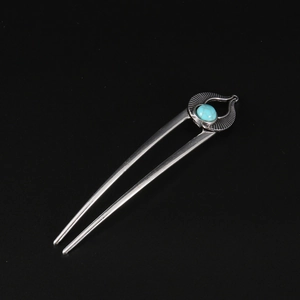 Vintage silver U-shaped hair pin with turquoise stone and decorative leaf pattern