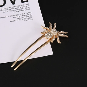 Elegant gold spider hair pin featuring high-quality rhinestones for a vintage style