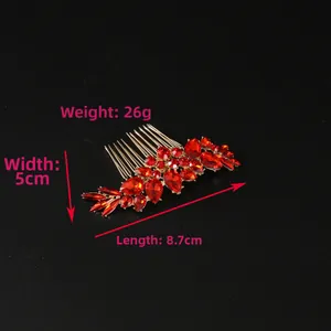 Detailed size map of gold leaf hair comb with red jewels measuring 8.7cm by 5cm
