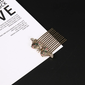 Vintage bronze butterfly hair comb with pink and green rhinestones for women