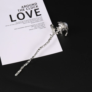 Vintage silver rose hair pin with pearl accent and natural branch texture for women