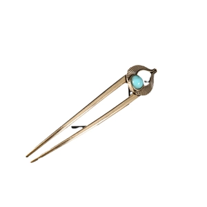 Vintage gold U-shaped hair fork with turquoise stone and fan-shaped design