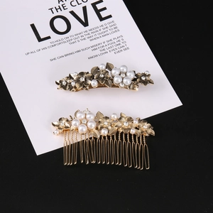 Elegant gold flower hair comb set with pearls and rhinestones on black background