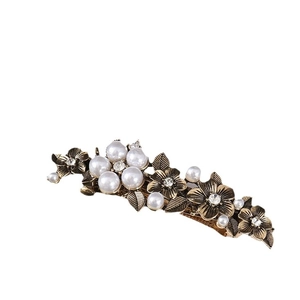 Vintage floral hair comb with pearls and rhinestones on bronze alloy base