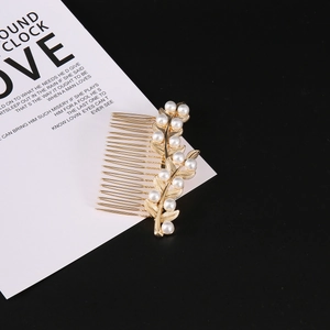 Elegant gold leaf hair comb with white pearls for women's French style hair styling